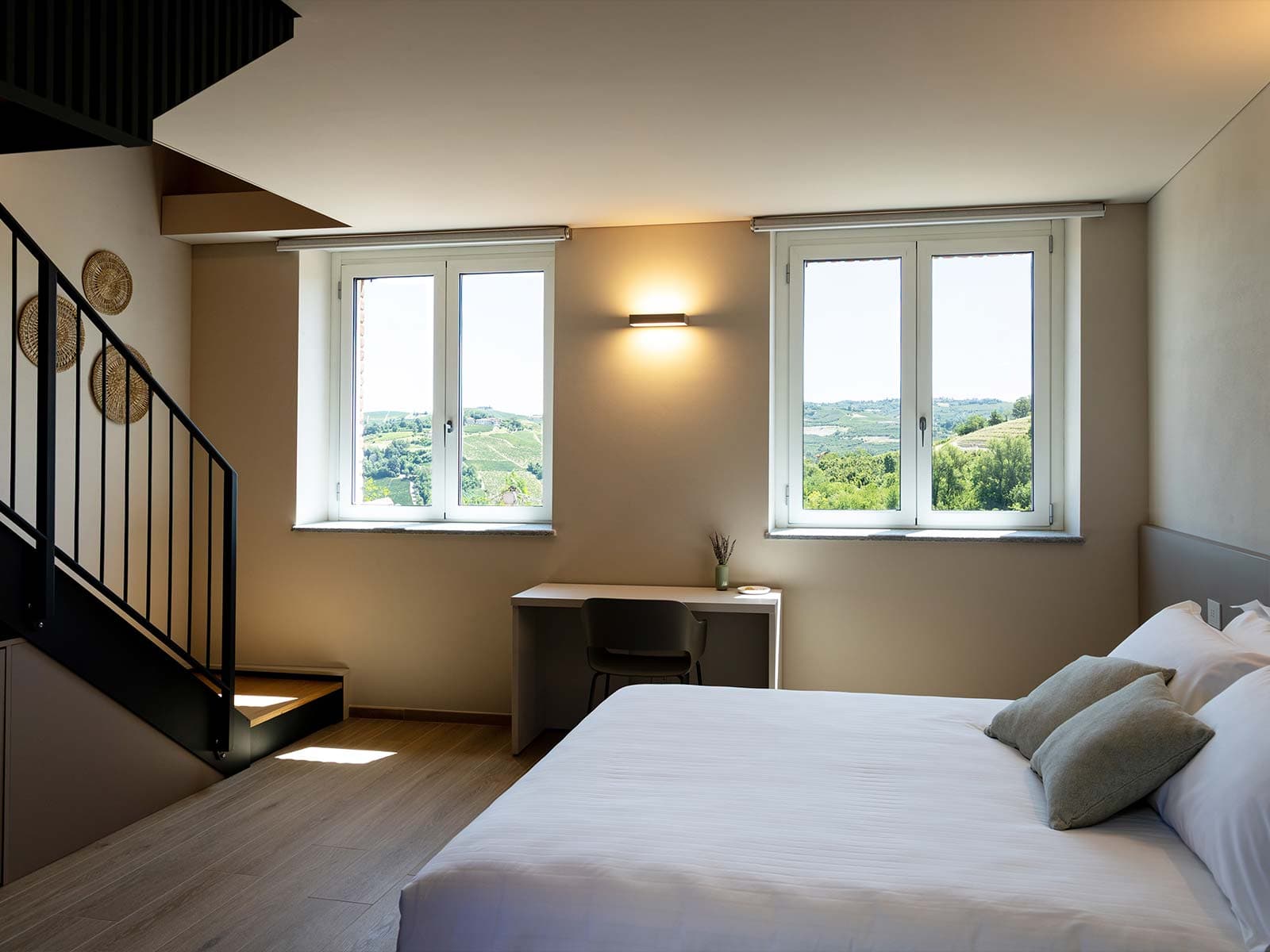 Camera Deluxe letto vista colline